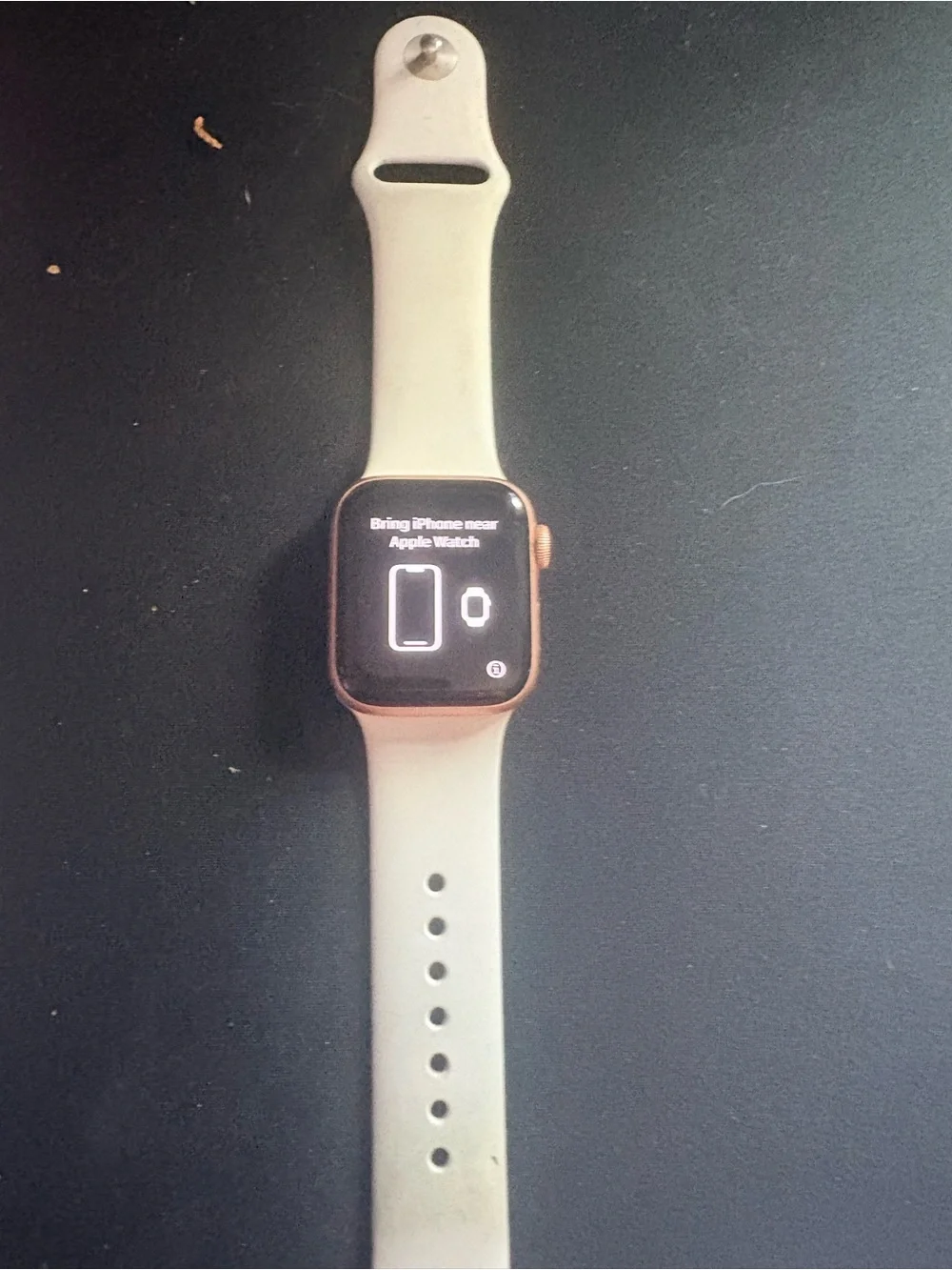 Apple Watch Pink Gold Case with Cream Sport Band